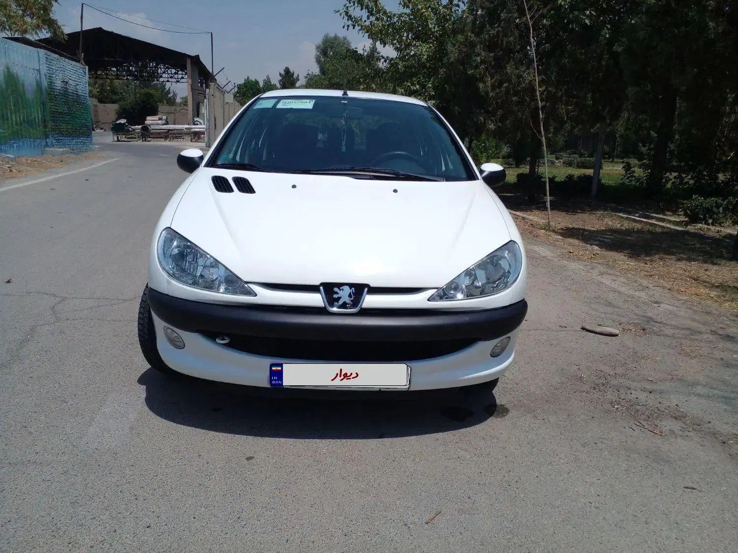 پژو ۲۰۶ صندوق دار v8 - 1396