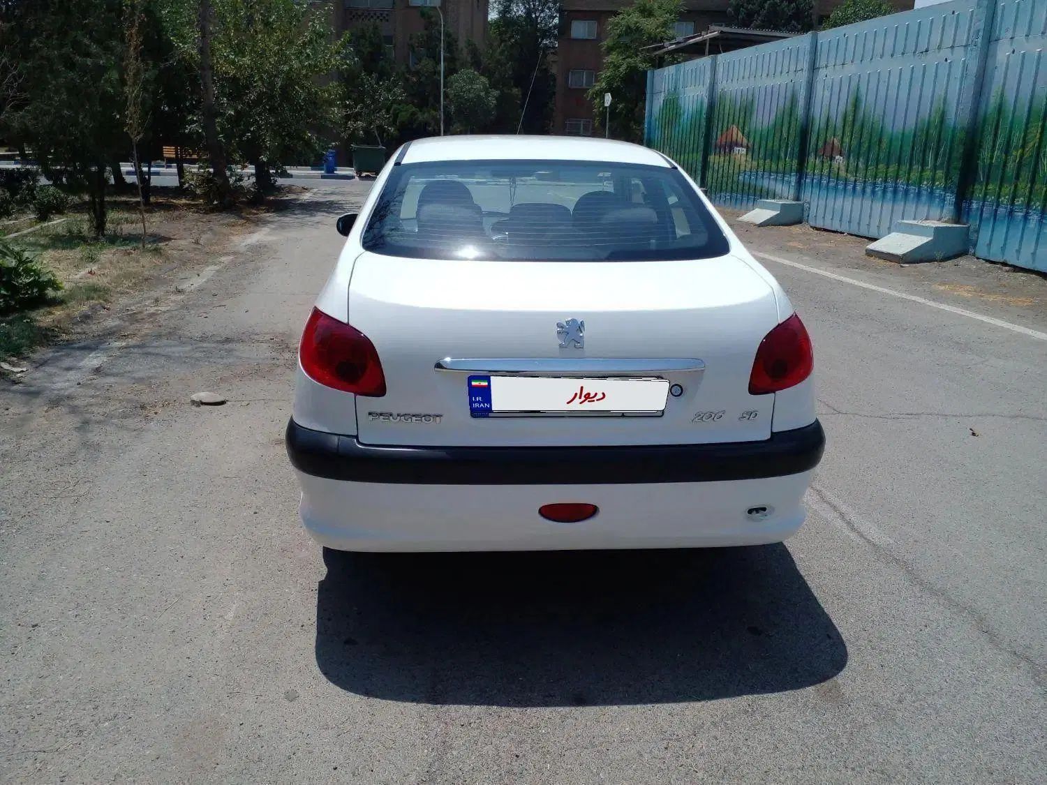 پژو ۲۰۶ صندوق دار v8 - 1396