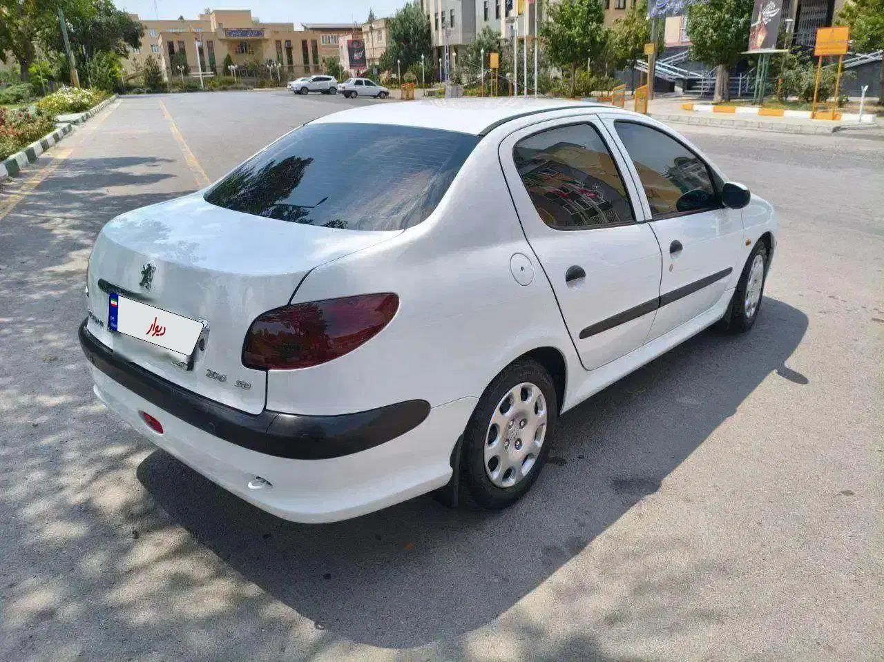 پژو ۲۰۶ صندوق دار v8 - 1396