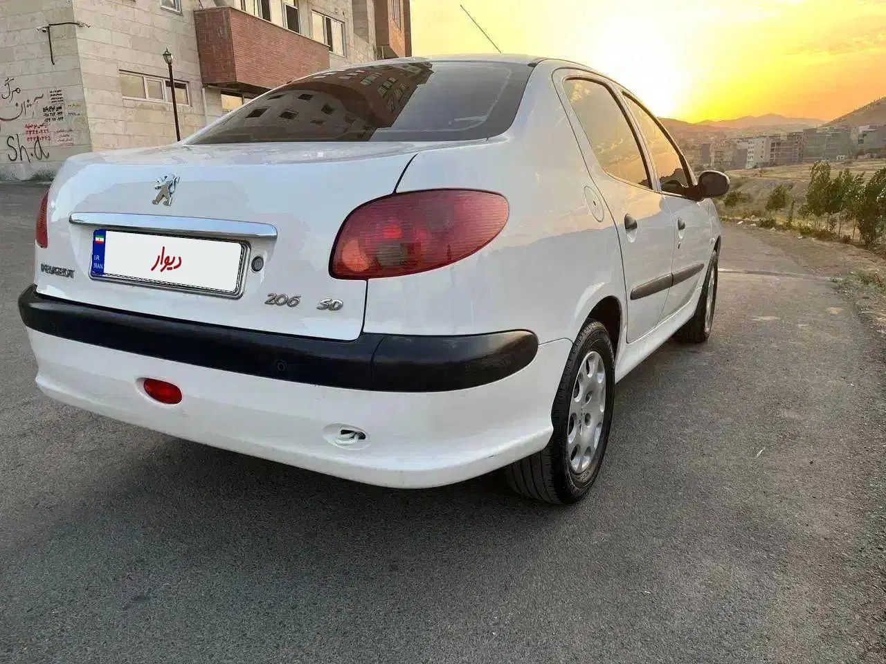 پژو ۲۰۶ صندوق دار v8 - 1395