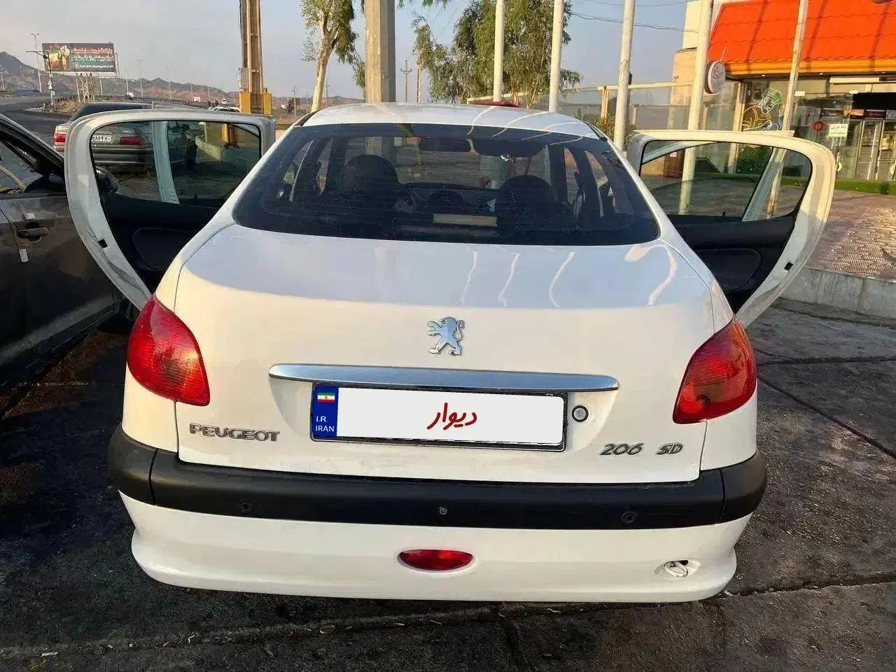 پژو ۲۰۶ صندوق دار v8 - 1396