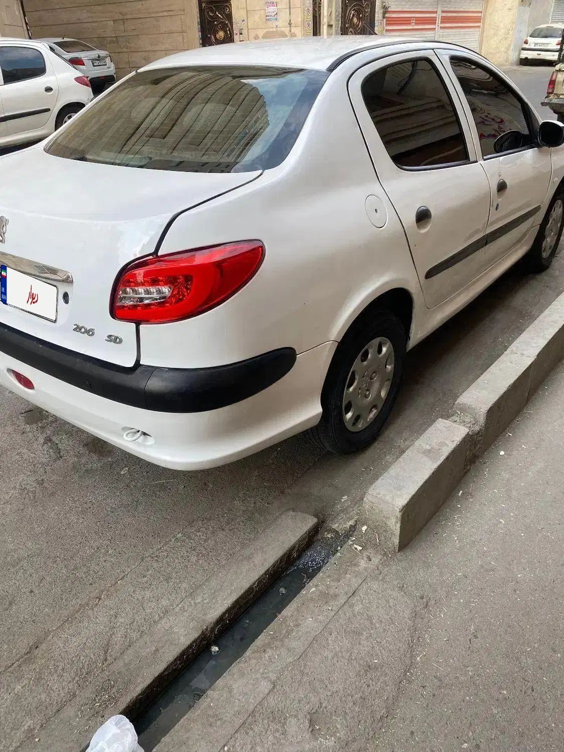 پژو ۲۰۶ صندوق دار v8 - 1396