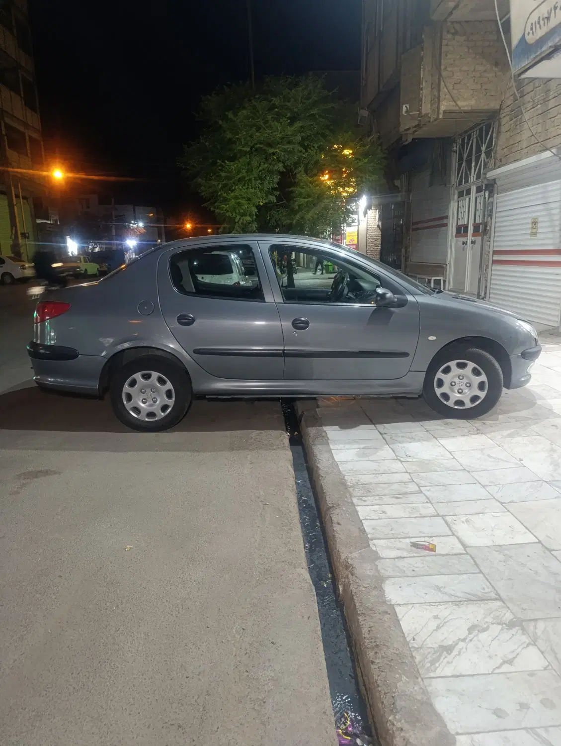 پژو ۲۰۶ صندوق دار v8 - 1395