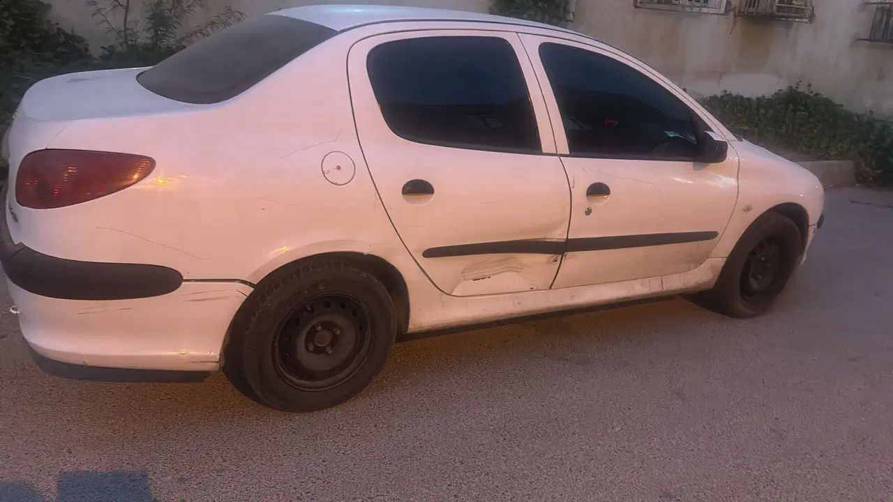 پژو ۲۰۶ صندوق دار v8 - 1395