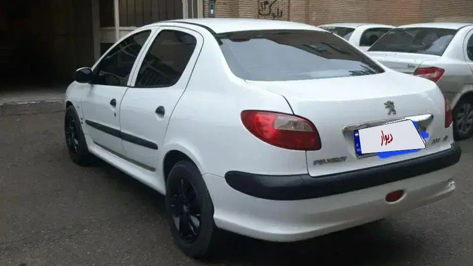 پژو ۲۰۶ صندوق دار v8 - 1396