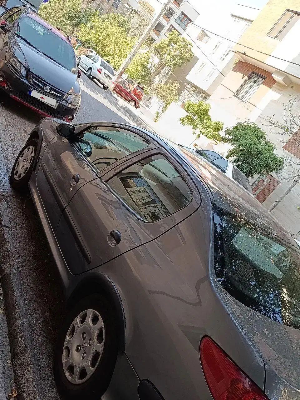 پژو ۲۰۶ صندوق دار v8 - 1396