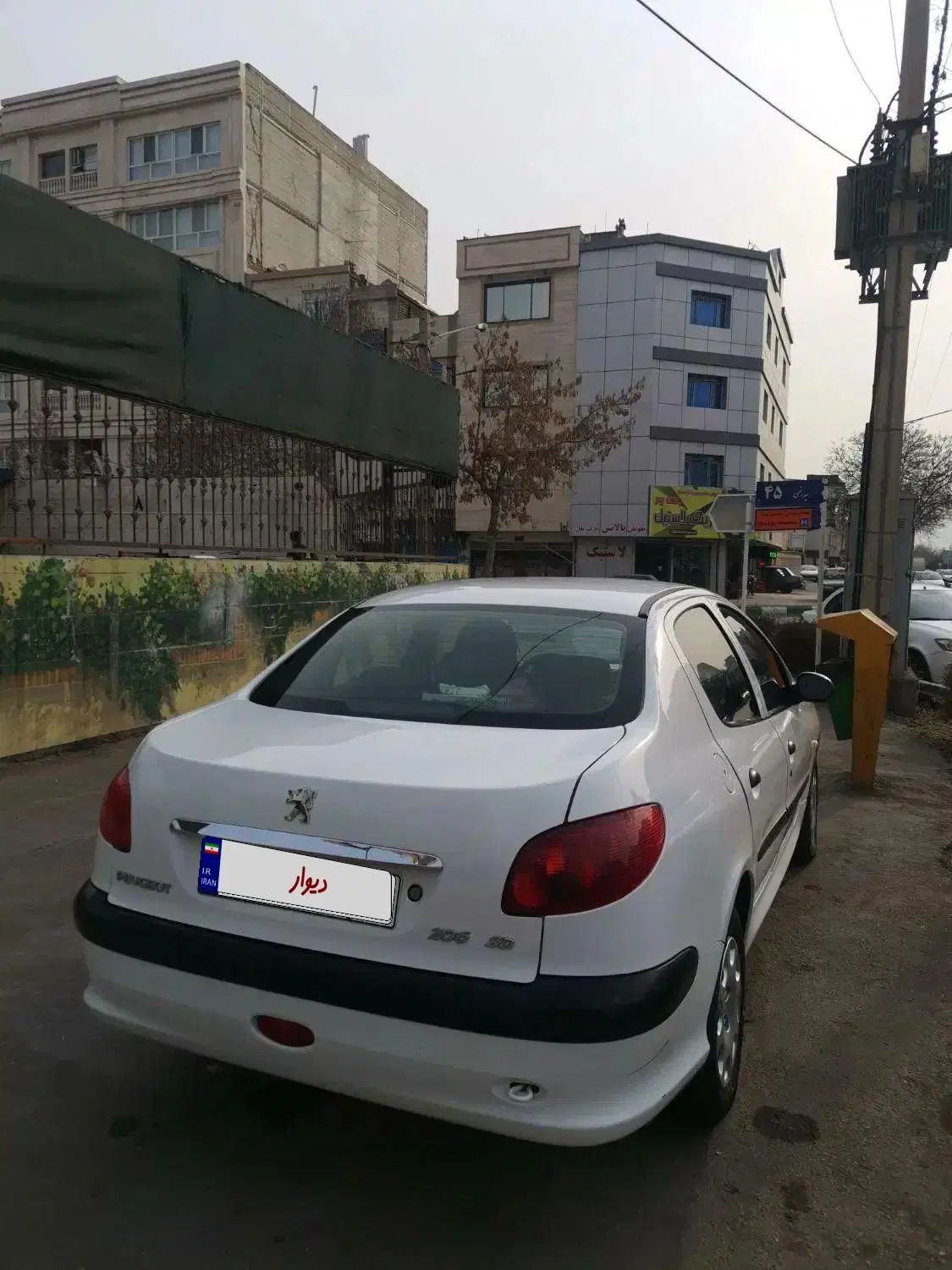 پژو ۲۰۶ صندوق دار v8 - 1397
