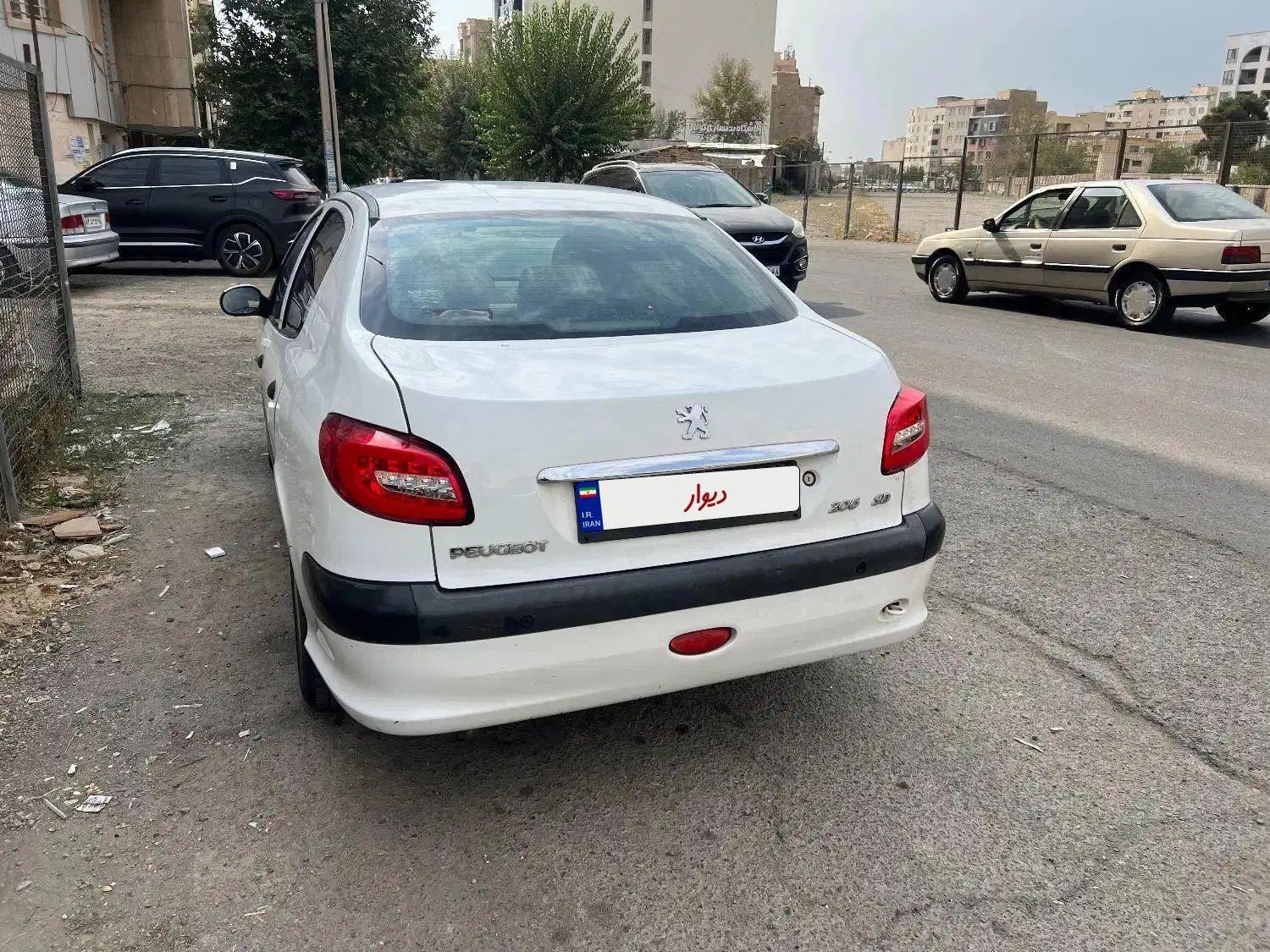 پژو ۲۰۶ صندوق دار v8 - 1397