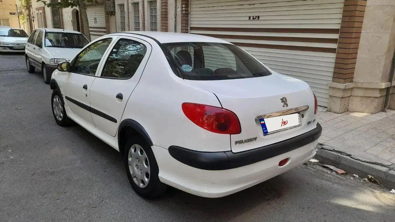 پژو ۲۰۶ صندوق دار v8 - 1397