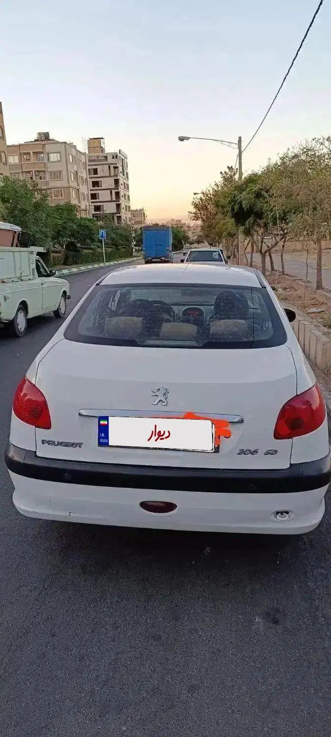 پژو ۲۰۶ صندوق دار v8 - 1396