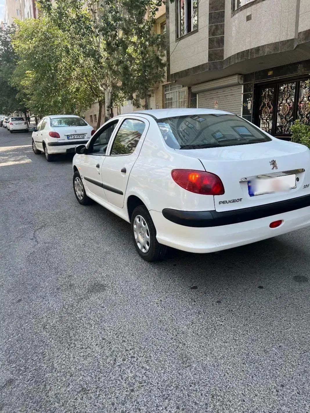 پژو ۲۰۶ صندوق دار v8 - 1397