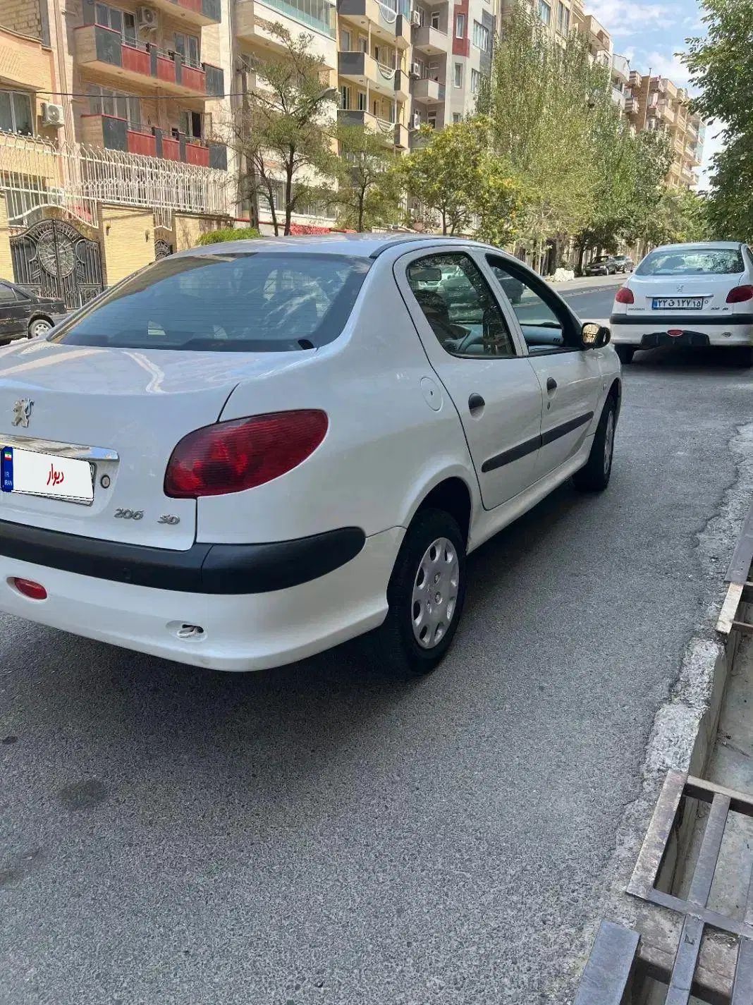 پژو ۲۰۶ صندوق دار v8 - 1397
