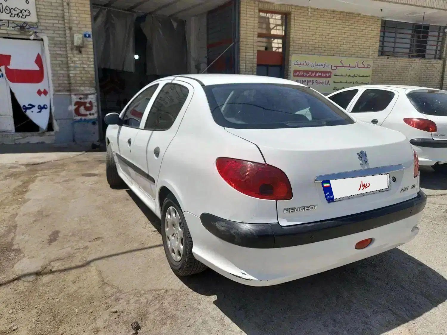 پژو ۲۰۶ صندوق دار v8 - 1398