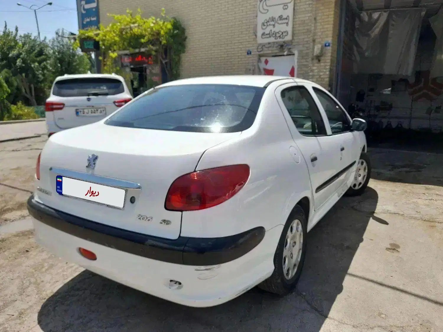 پژو ۲۰۶ صندوق دار v8 - 1398