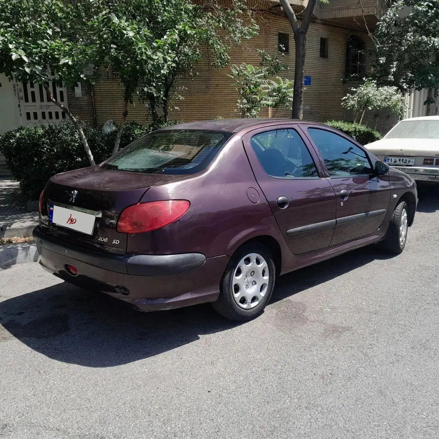 پژو ۲۰۶ صندوق دار v8 - 1394