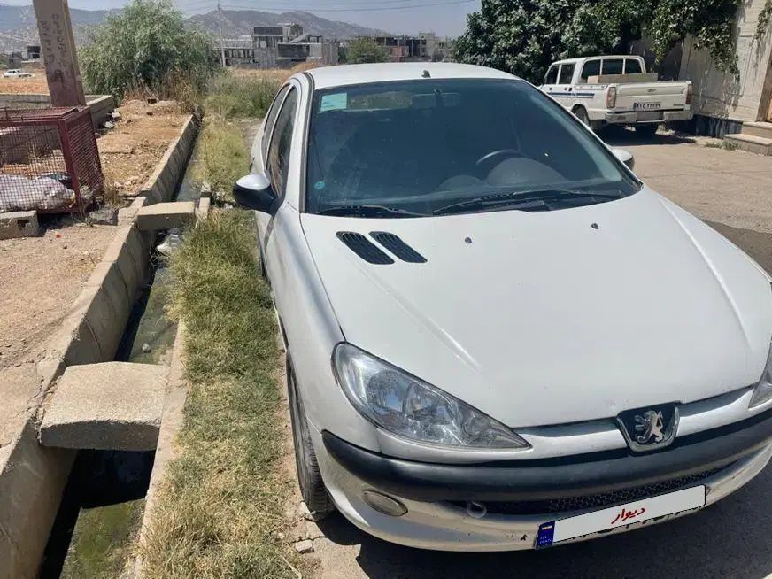 پژو ۲۰۶ صندوق دار v8 - 1396