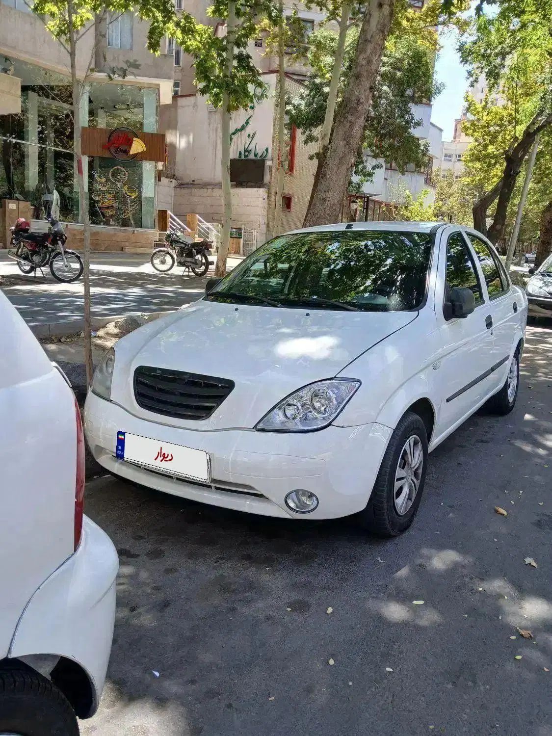 تیبا صندوق دار SX - 1400