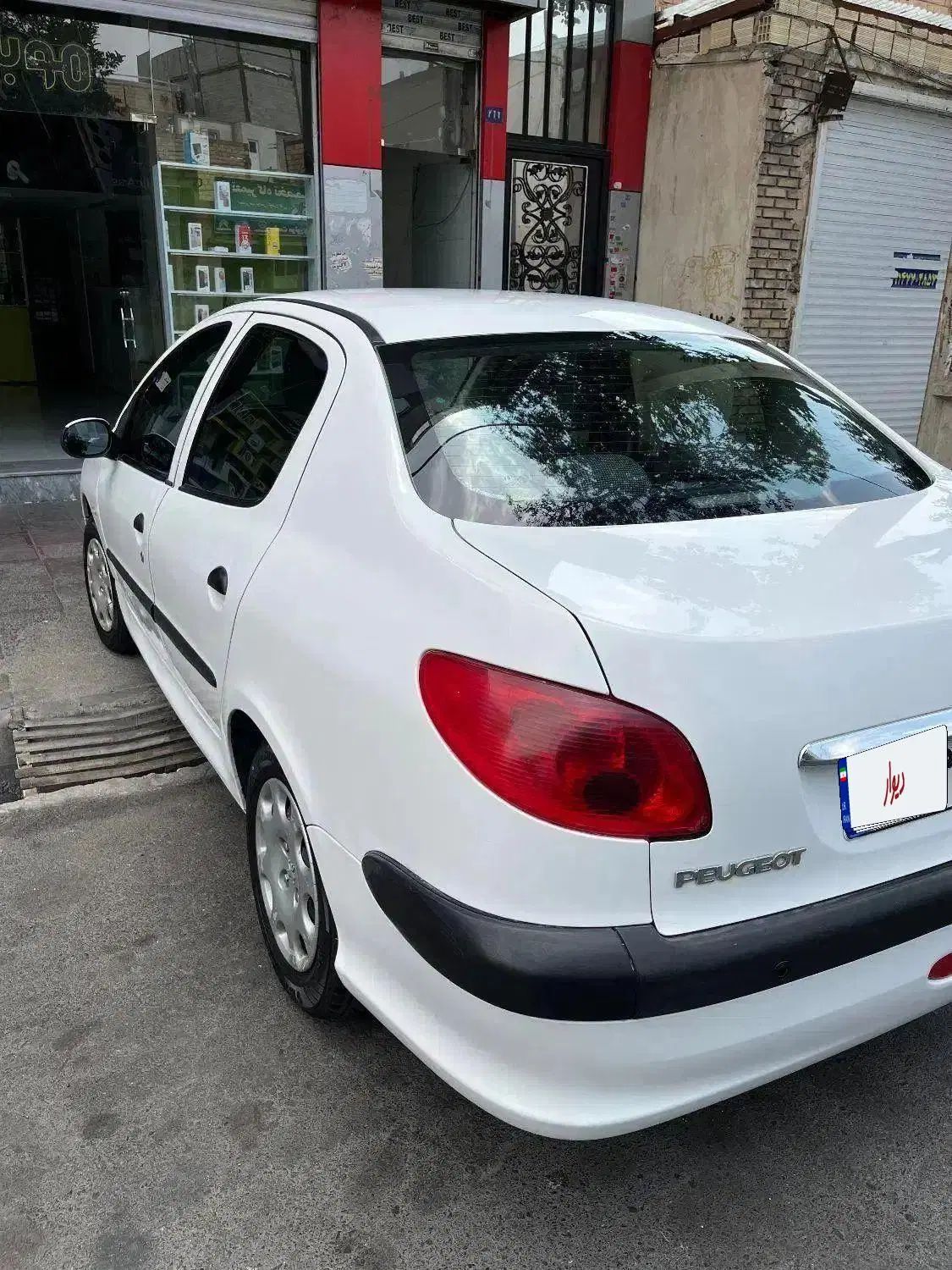 پژو ۲۰۶ صندوق دار v8 - 1397