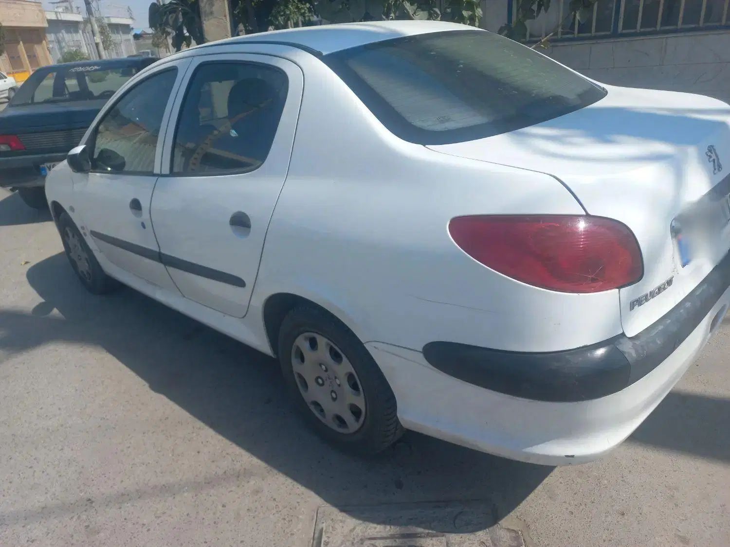 پژو ۲۰۶ صندوق دار v8 - 1396