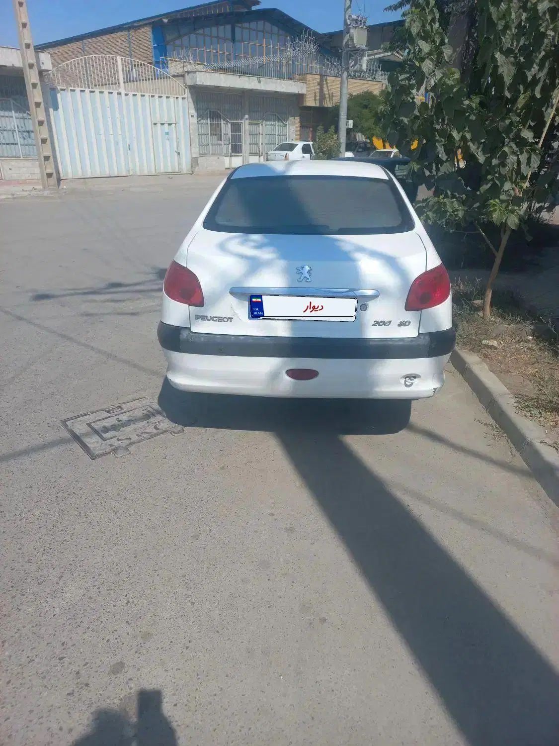 پژو ۲۰۶ صندوق دار v8 - 1396