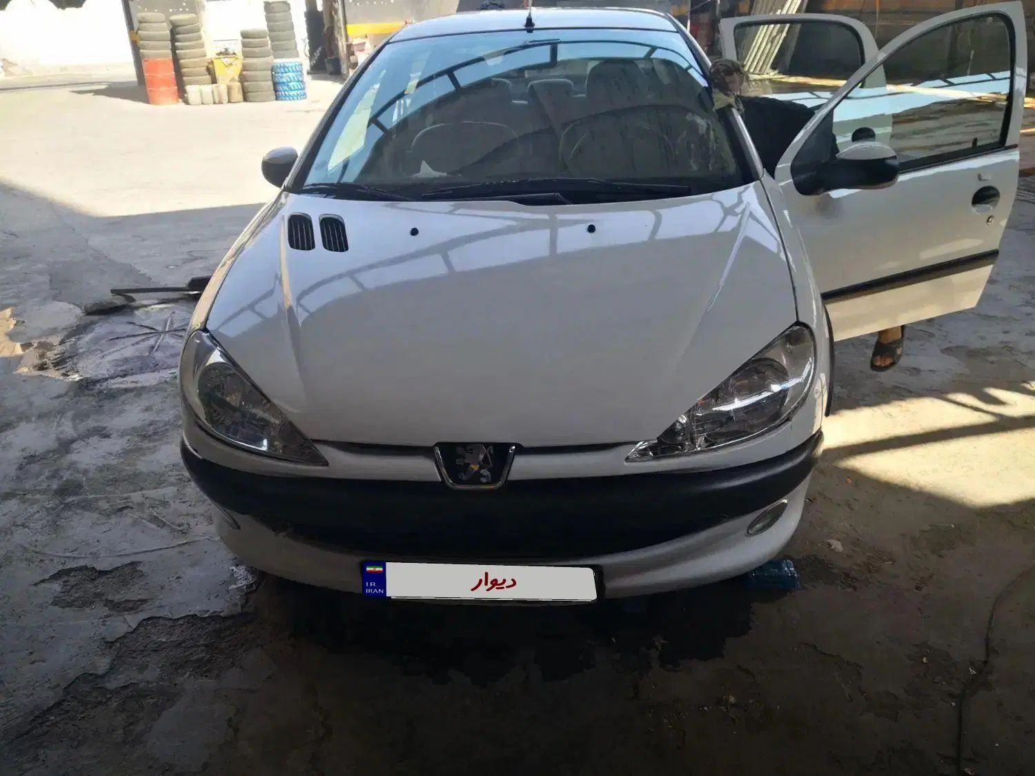 پژو ۲۰۶ صندوق دار v8 - 1396