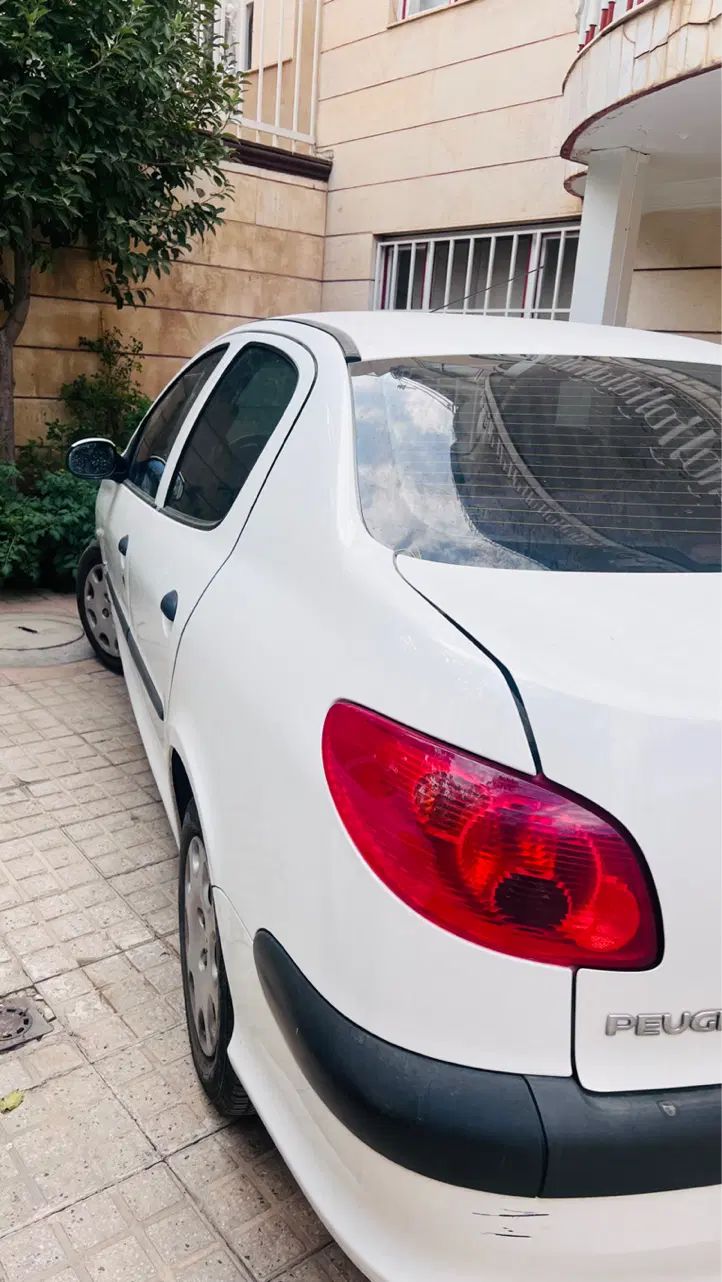 پژو ۲۰۶ صندوق دار v8 - 1395