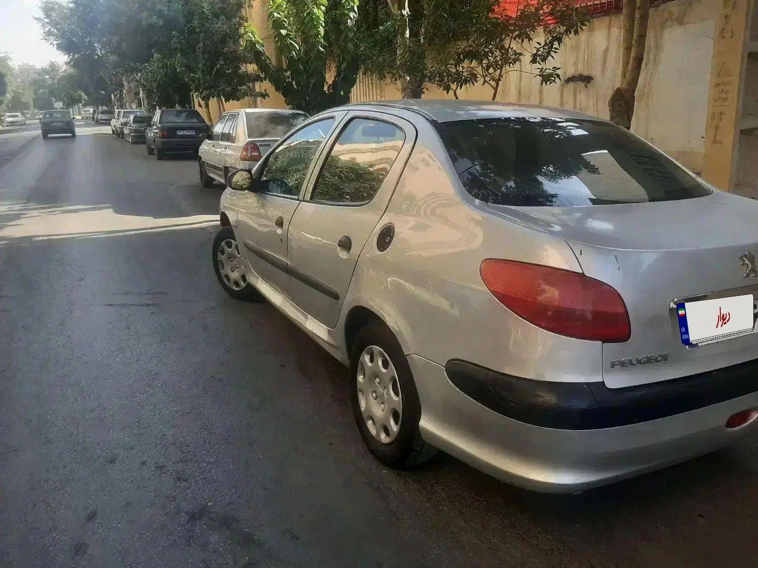 پژو ۲۰۶ صندوق دار v8 - 1390