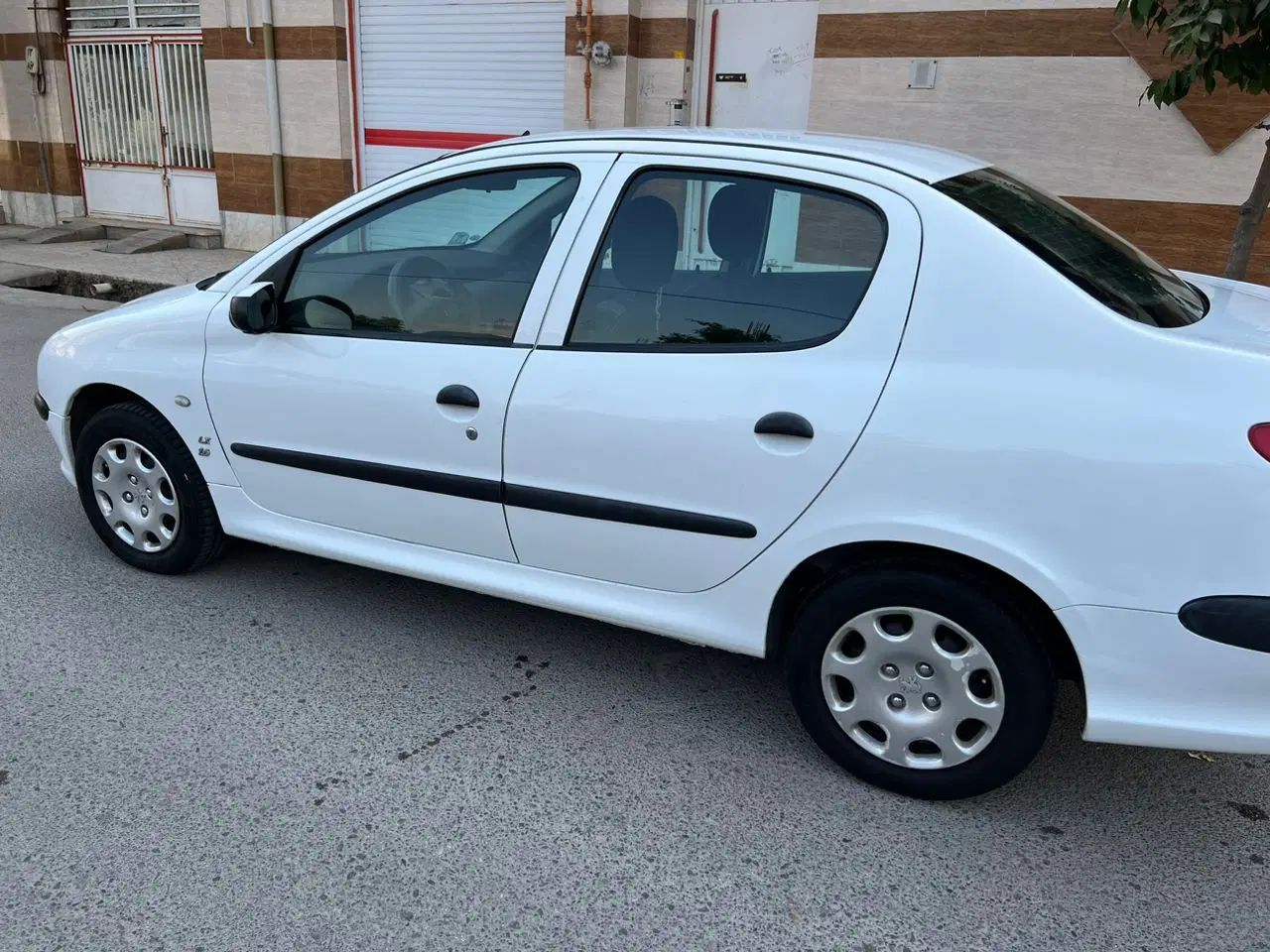 پژو ۲۰۶ صندوق دار v8 - 1394