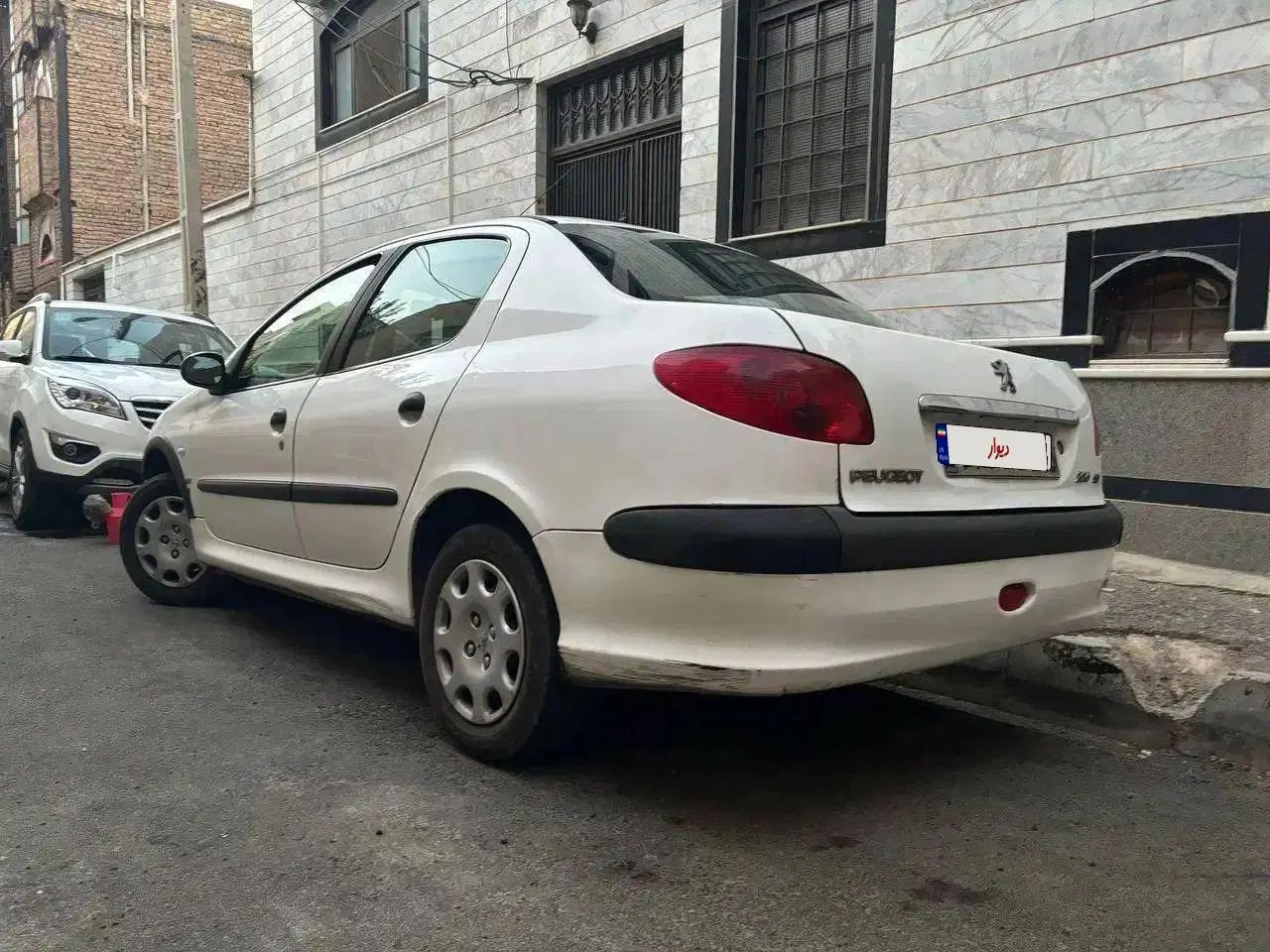 پژو ۲۰۶ صندوق دار v8 - 1390