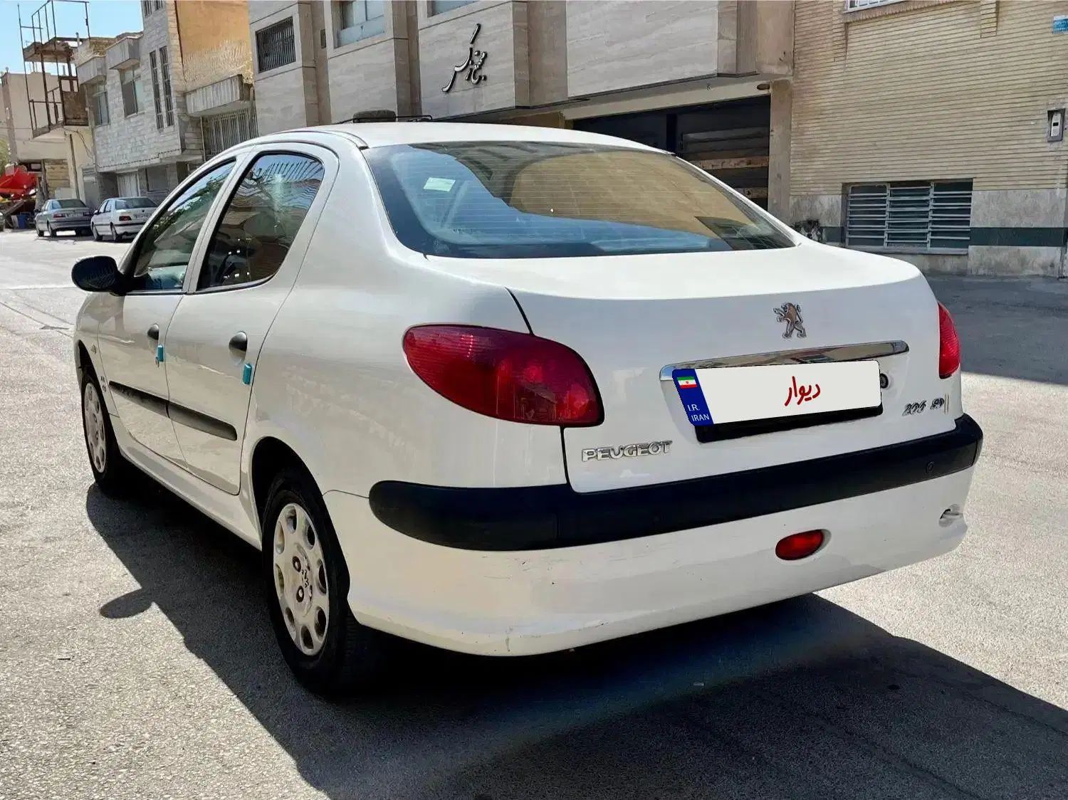 پژو ۲۰۶ صندوق دار v8 - 1396