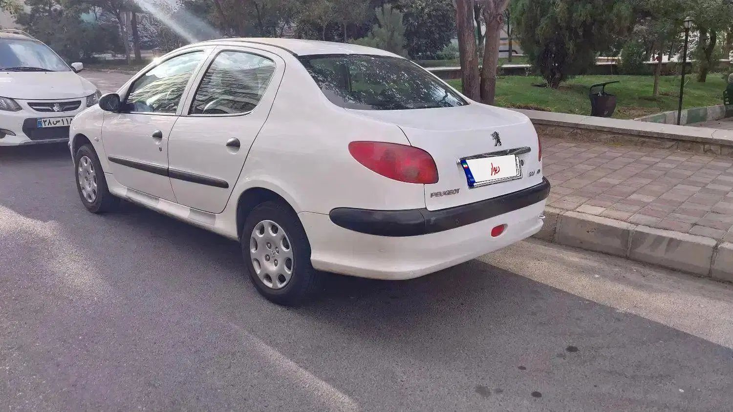 پژو ۲۰۶ صندوق دار v8 - 1395