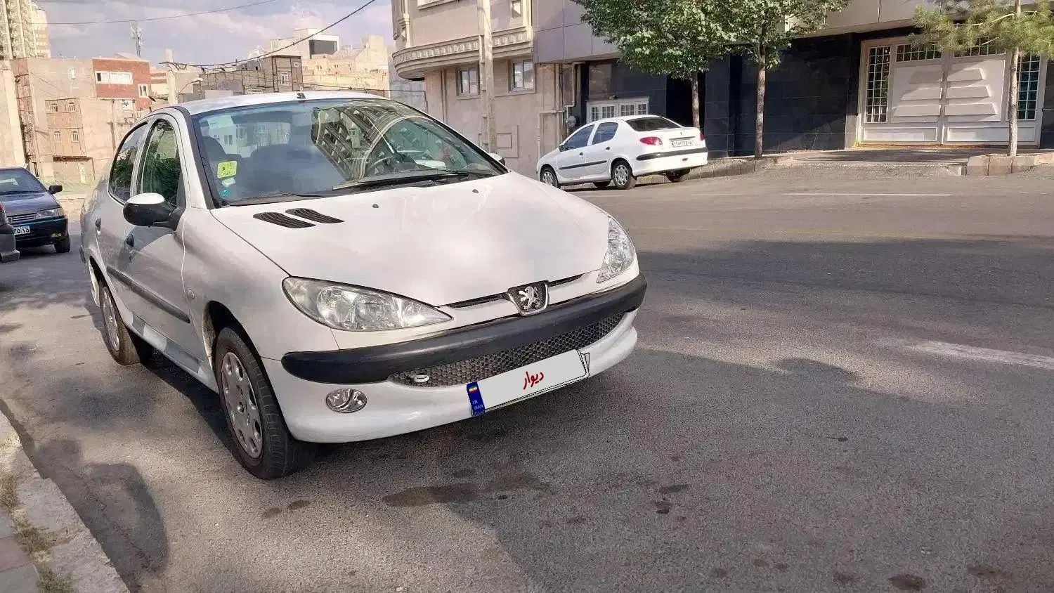 پژو ۲۰۶ صندوق دار v8 - 1395