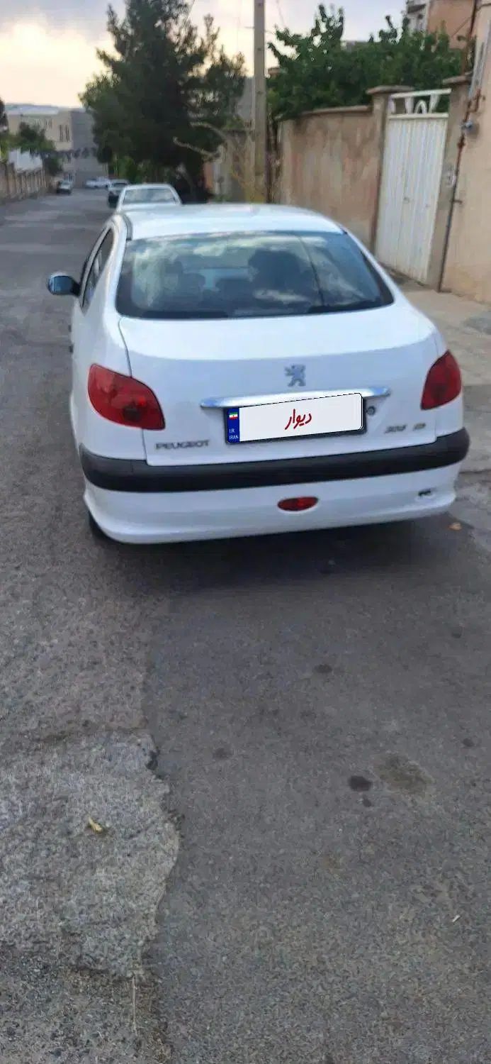 پژو ۲۰۶ صندوق دار v8 - 1391