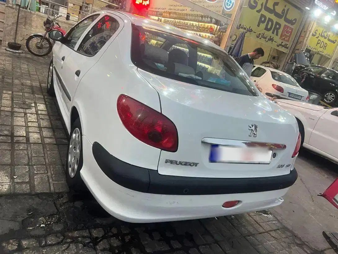 پژو ۲۰۶ صندوق دار v8 - 1396
