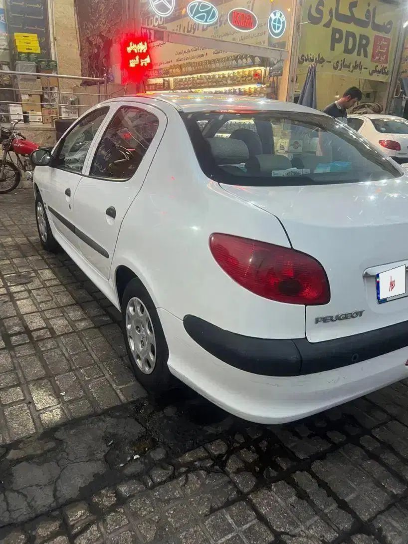 پژو ۲۰۶ صندوق دار v8 - 1396
