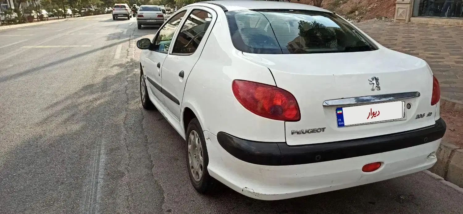 پژو ۲۰۶ صندوق دار v8 - 1396