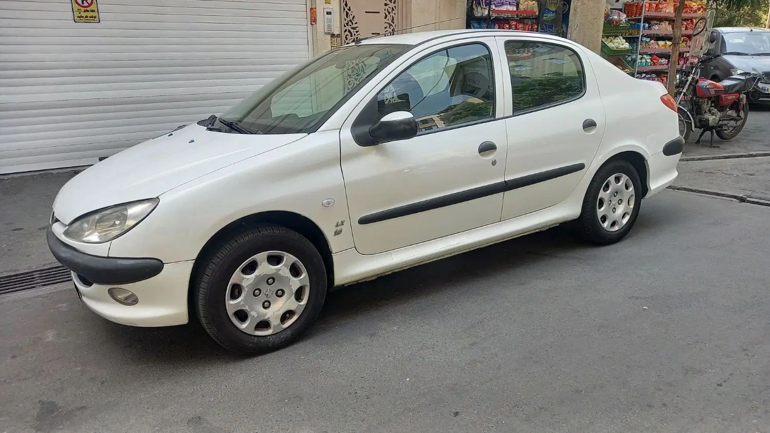 پژو ۲۰۶ صندوق دار v8 - 1393