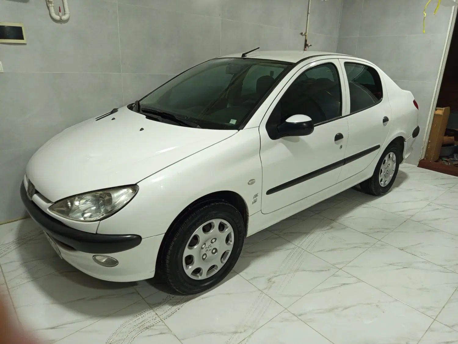 پژو ۲۰۶ صندوق دار v8 - 1391