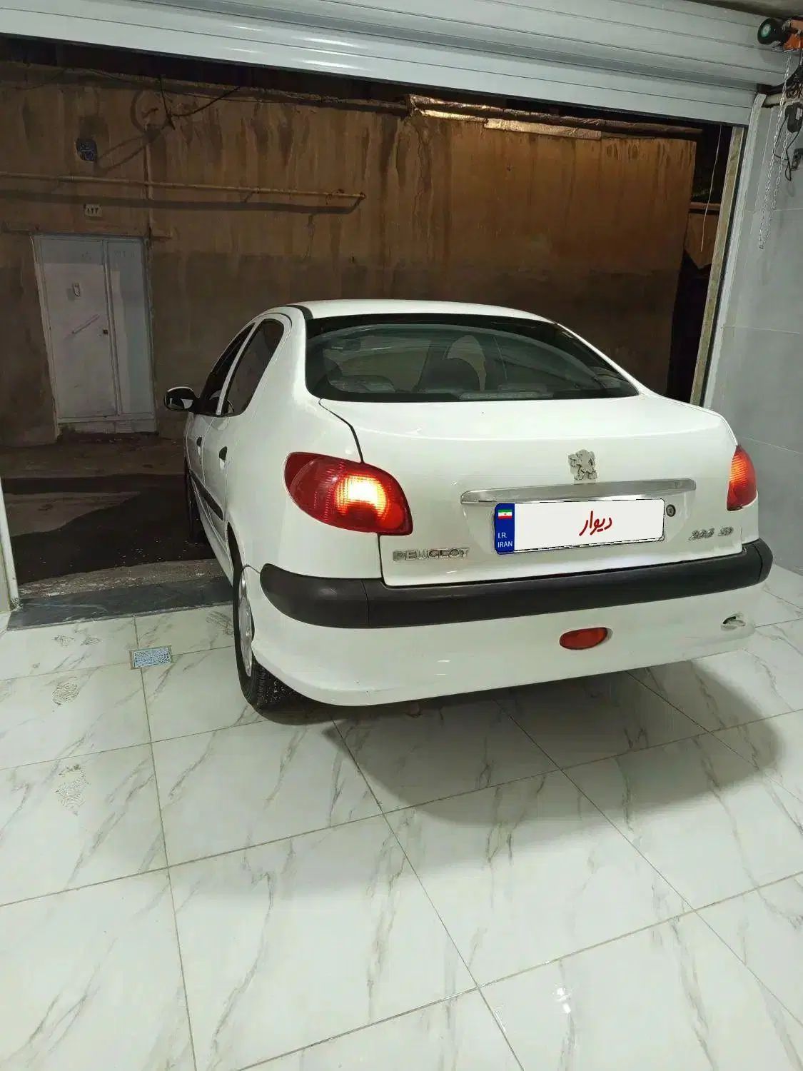 پژو ۲۰۶ صندوق دار v8 - 1391