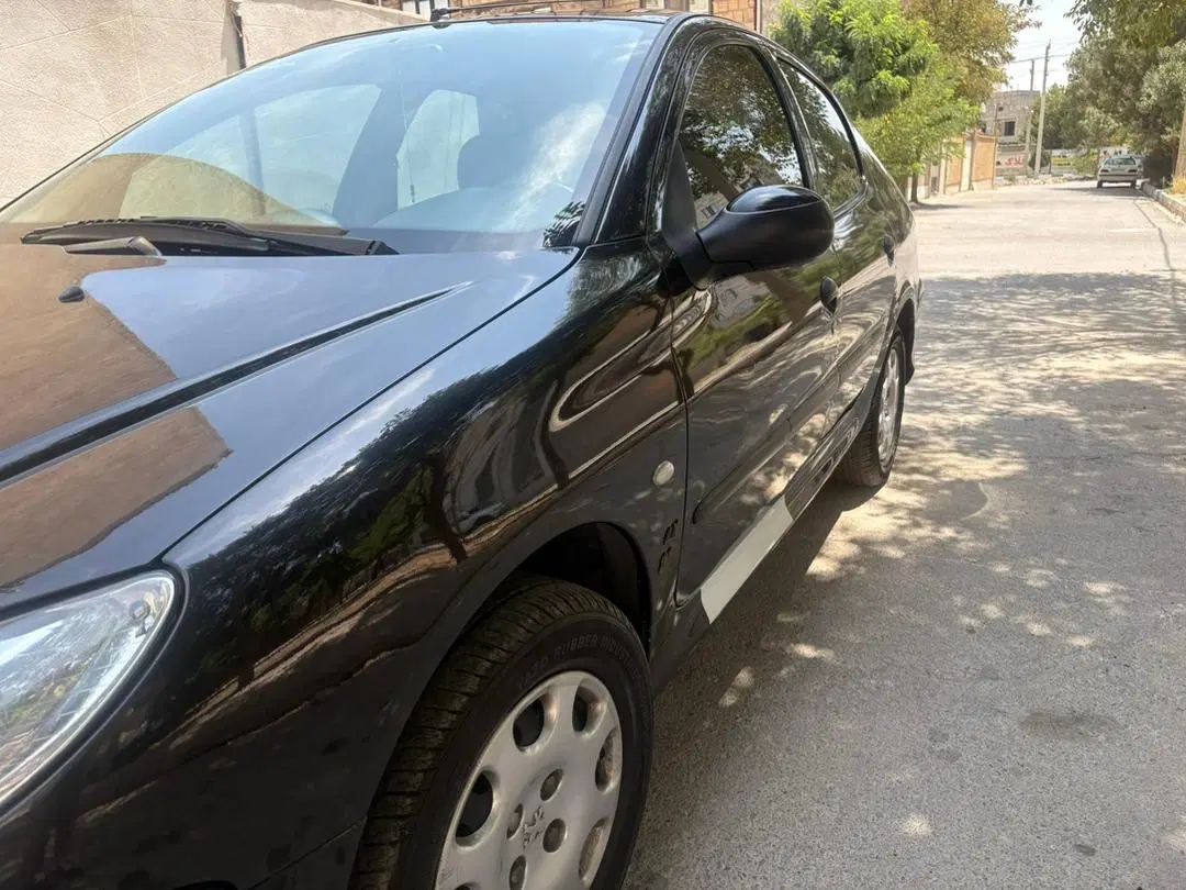 پژو ۲۰۶ صندوق دار v8 - 1395