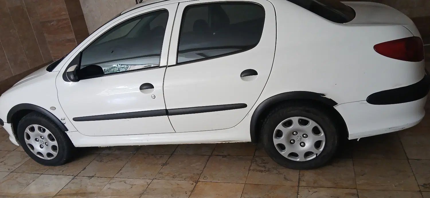 پژو ۲۰۶ صندوق دار v8 - 1396