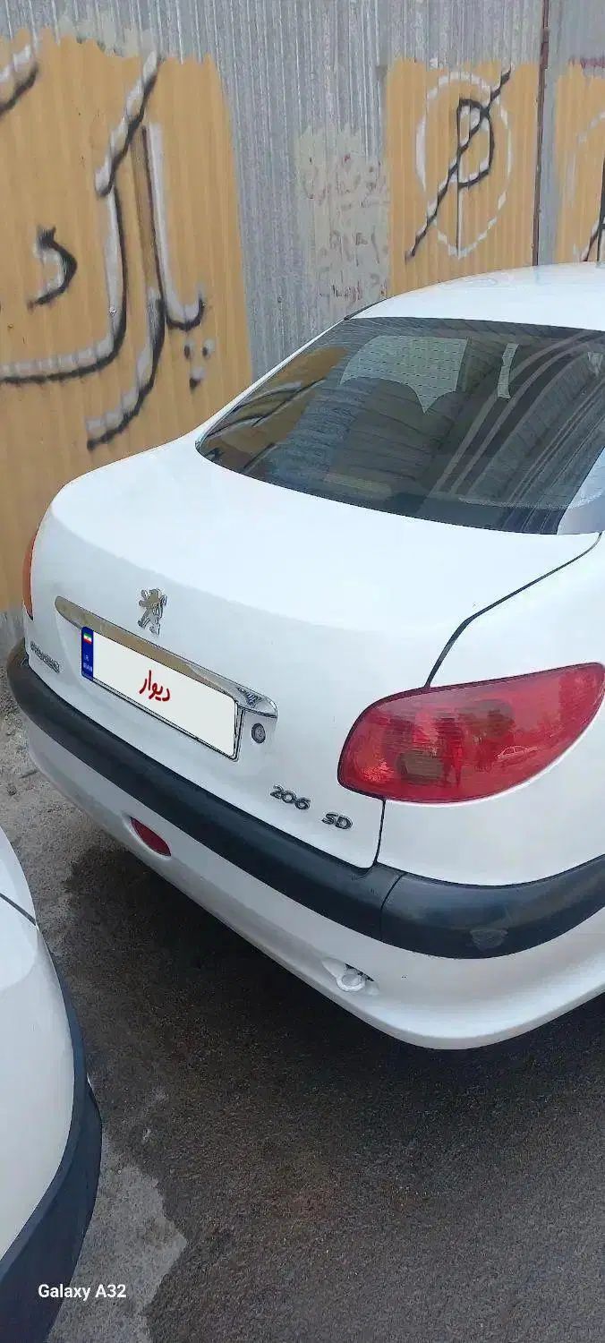 پژو ۲۰۶ صندوق دار v8 - 1391