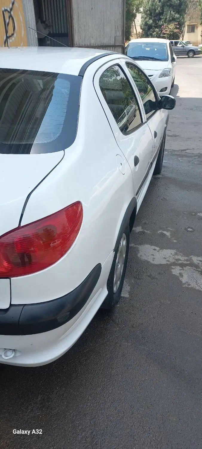 پژو ۲۰۶ صندوق دار v8 - 1391