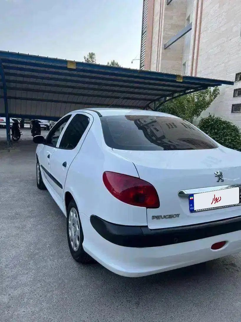 پژو ۲۰۶ صندوق دار v8 - 1396