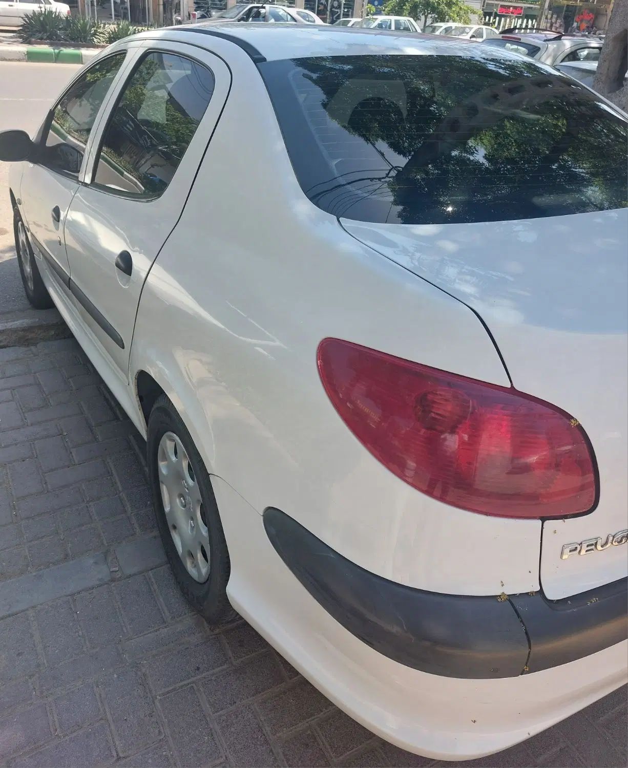 پژو ۲۰۶ صندوق دار v8 - 1395