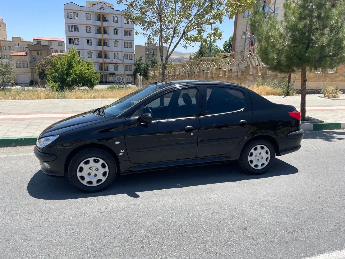 پژو ۲۰۶ صندوق دار v8 - 1397