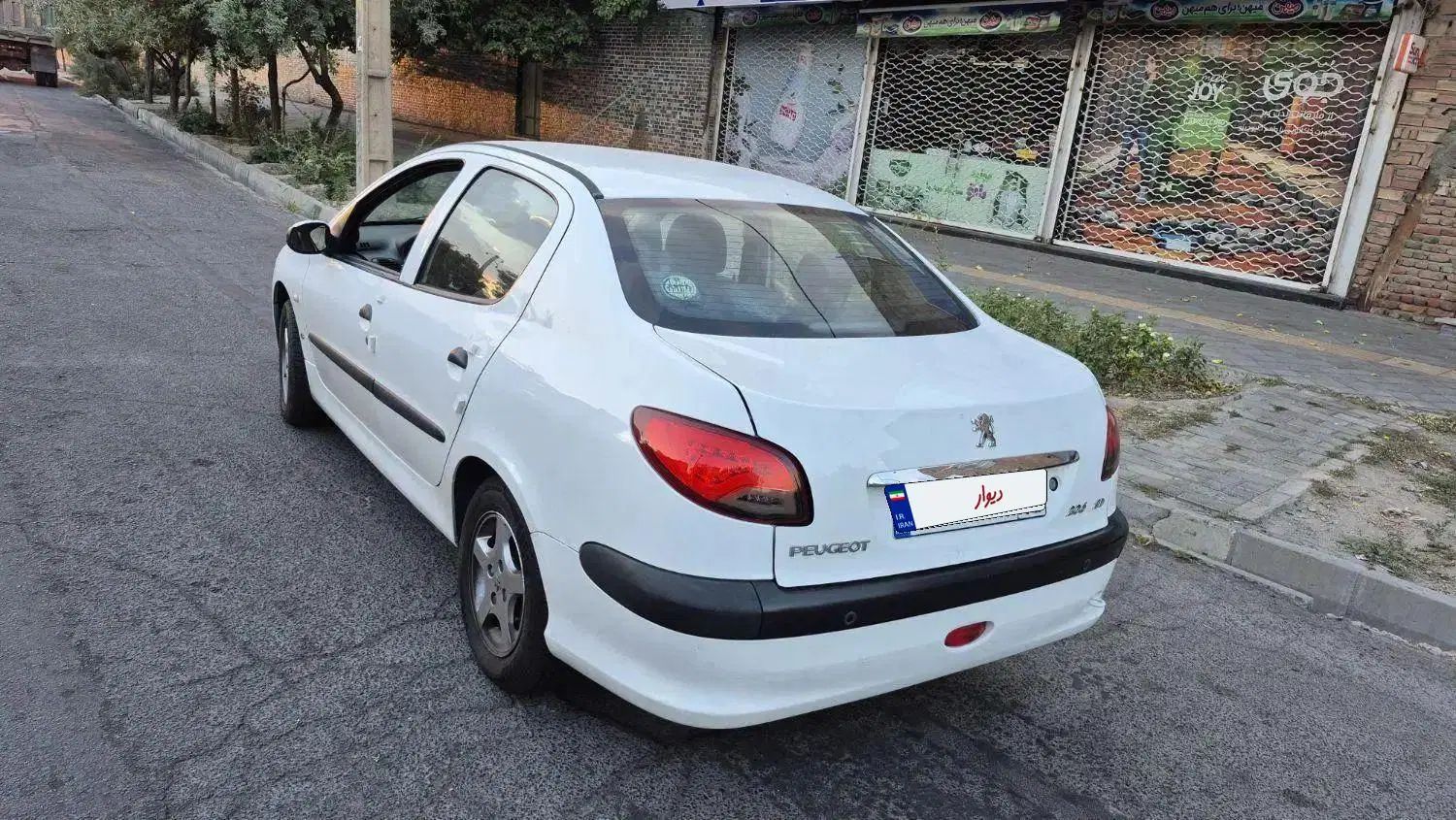 پژو ۲۰۶ صندوق دار v8 - 1398