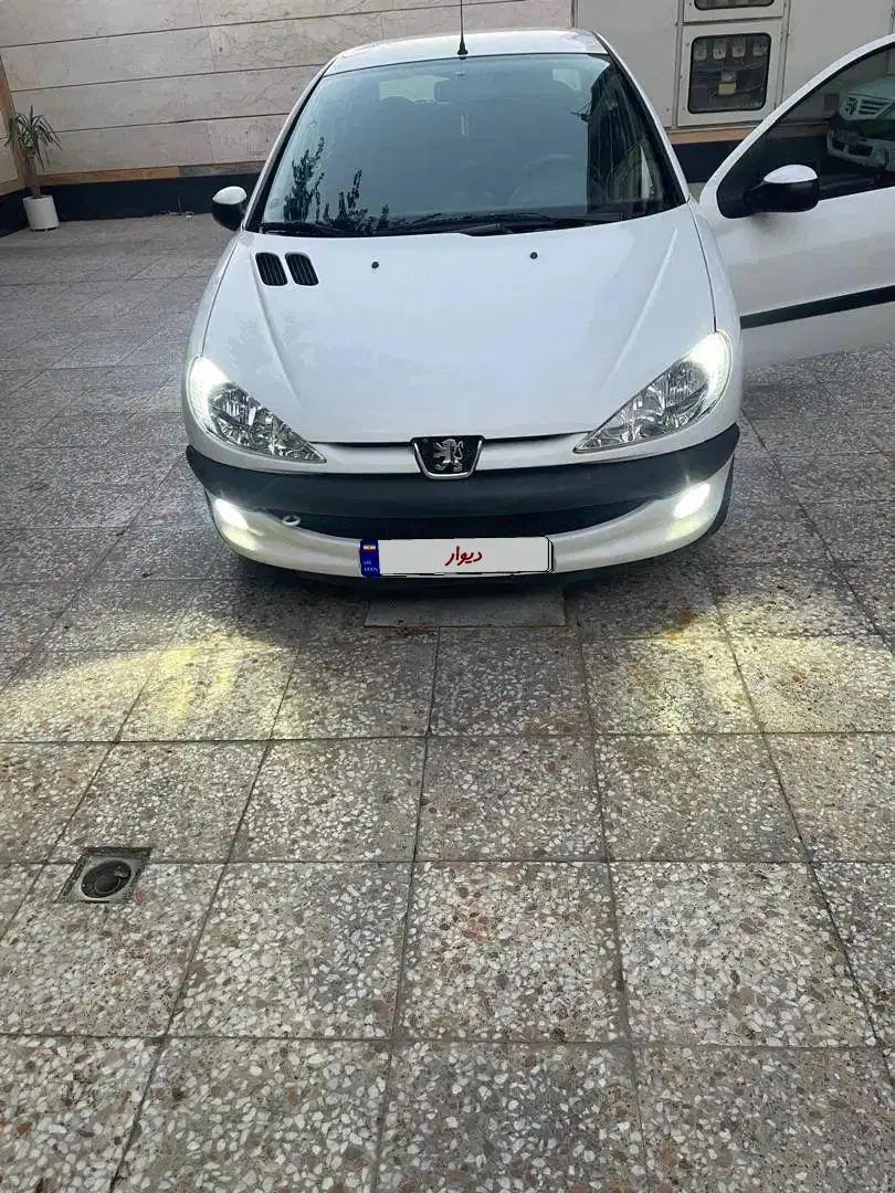 پژو ۲۰۶ صندوق دار v8 - 1396