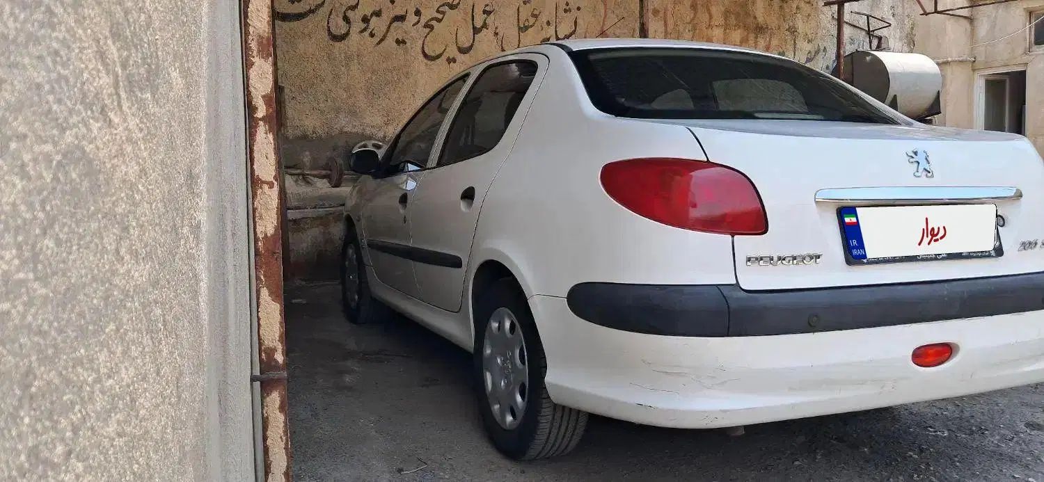 پژو ۲۰۶ صندوق دار v8 - 1393
