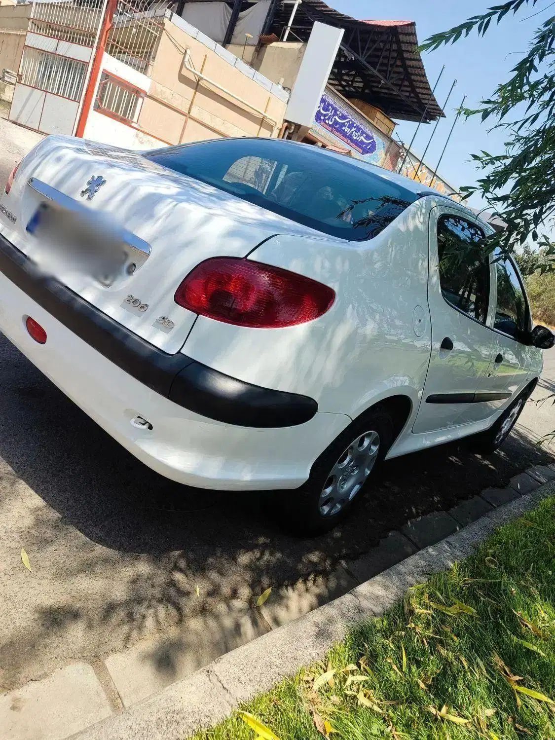 پژو ۲۰۶ صندوق دار v8 - 1399